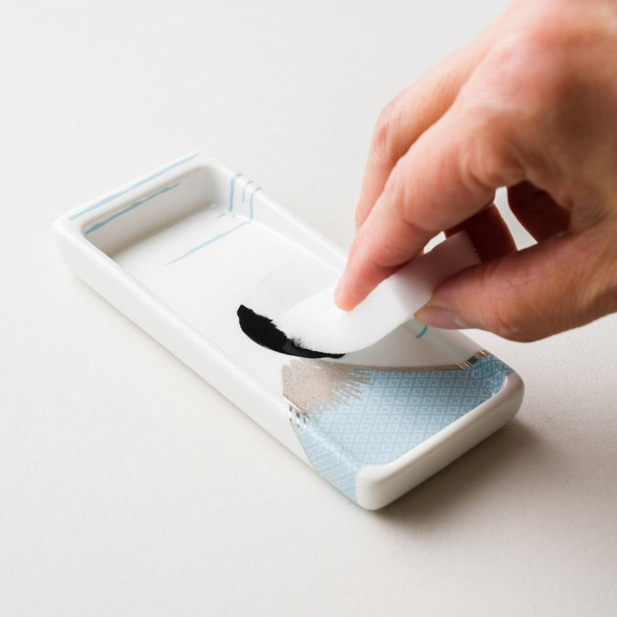 Grinding ink on the patterned side